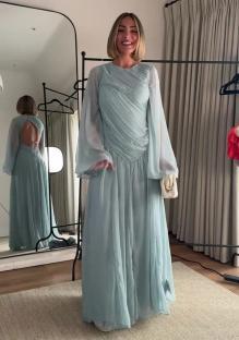 Woman in a light blue gown.