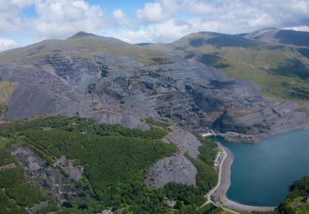 Aerial view of Dinorwig slate quarry, Llyn Peris lake, and Elidir Fawr mountain.