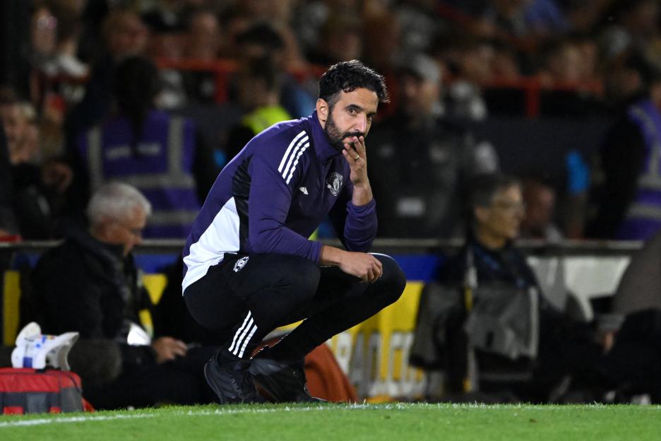 Ruben Amorim, Manchester United manager, looking dejected.