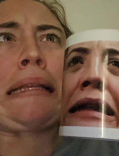 A woman's surprised face next to a mug with a surprised face printed on it.
