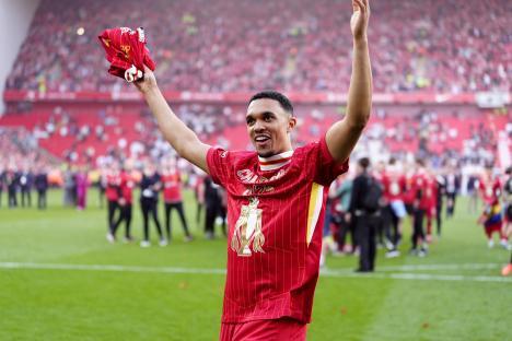 Trent Alexander-Arnold celebrates Liverpool's Premier League victory.