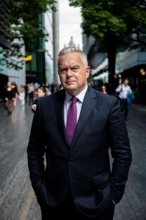 Headshot of Huw Edwards.