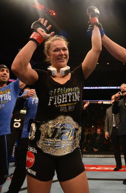 a woman wearing a shirt that says ultimate fighting