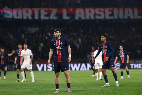 PSG fans unfurl banner aimed at Arsenal before suffering shock loss as Enrique admits ‘the players are clearly affected’