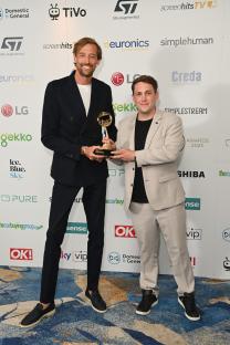 Peter Crouch and Chris Stark accepting a podcast award.