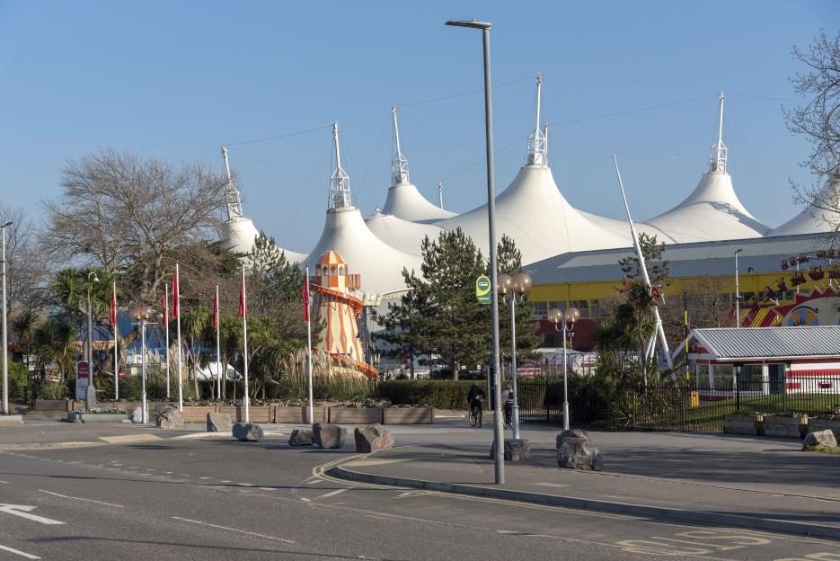Exterior view of Butlins holiday camp featuring large tent-like structures.