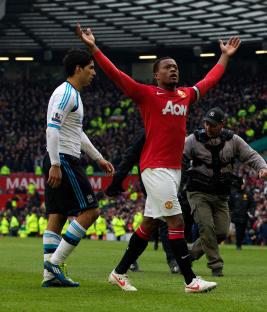 Patrice Evra celebrating a Manchester United victory.