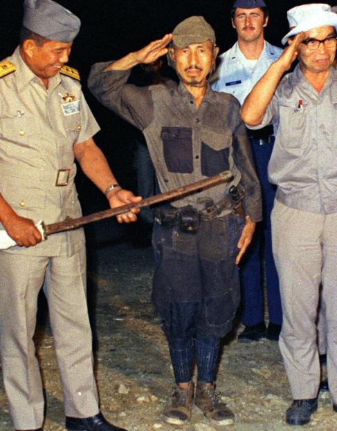 Hiroo Onoda surrendering his sword on Lubang Island.