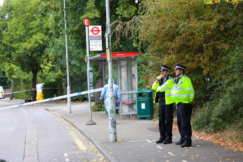 Police officers at a crime scene.