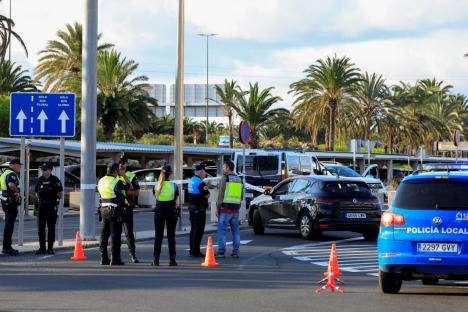 Knifeman who tried to rob taxi shot and killed by cops after lunging at officer outside airport at Brit holiday hotspot