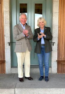 Prince Charles and Camilla, Duchess of Cornwall, clapping in appreciation for NHS workers.