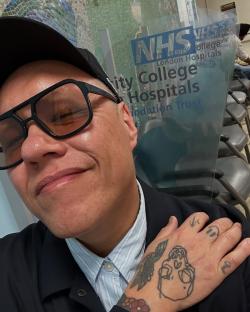 Selfie of Gok Wan in a hospital waiting area.