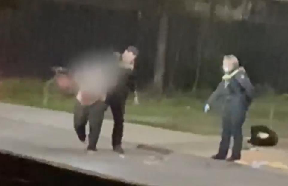 Police arresting a suspect.