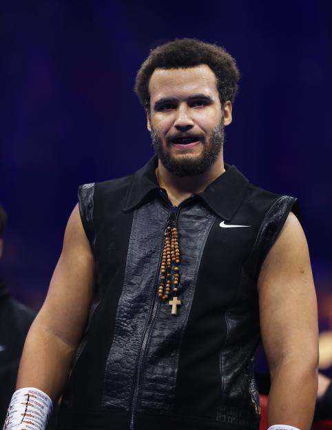 Moses Itauma, boxer, at a boxing match.