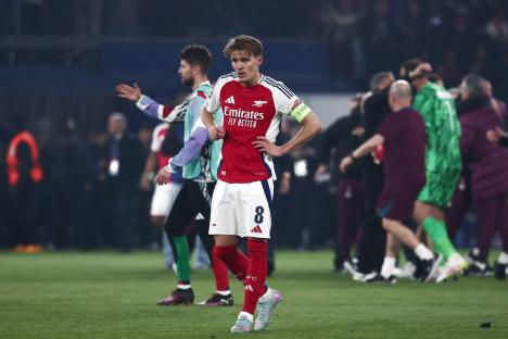 Martin Ãdegaard of Arsenal reacts after a Champions League match.