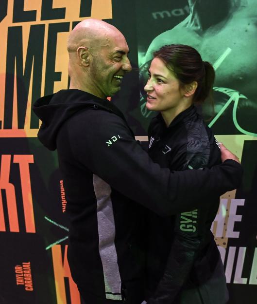 Katie Taylor and her father after weigh-ins.