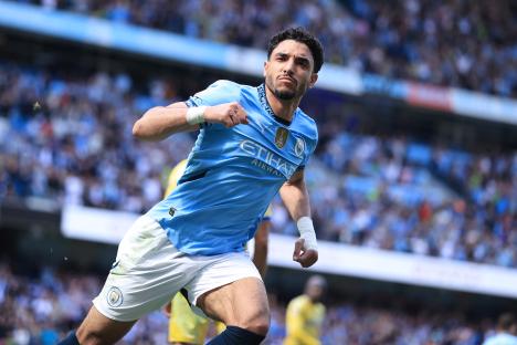 Omar Marmoush of Manchester City celebrating a goal.