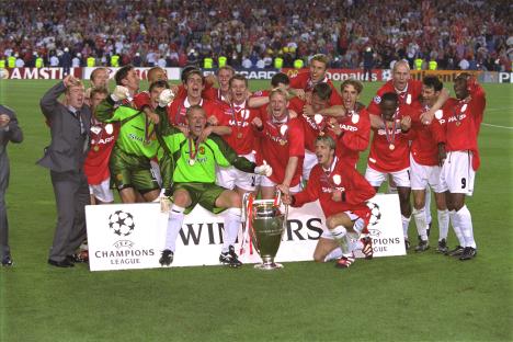 Manchester United team celebrating their UEFA Champions League victory.