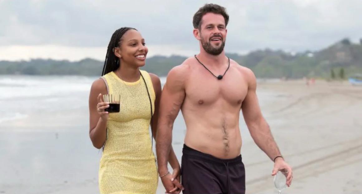 Jeremy and Bailey on a beach.