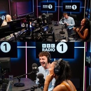 Three radio hosts laughing in a BBC Radio 1 studio.