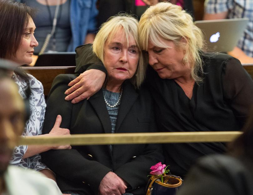 June Steenkamp, mother of Reeva Steenkamp, comforted during an appeals court hearing.