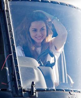 Ana de Armas in a helicopter.