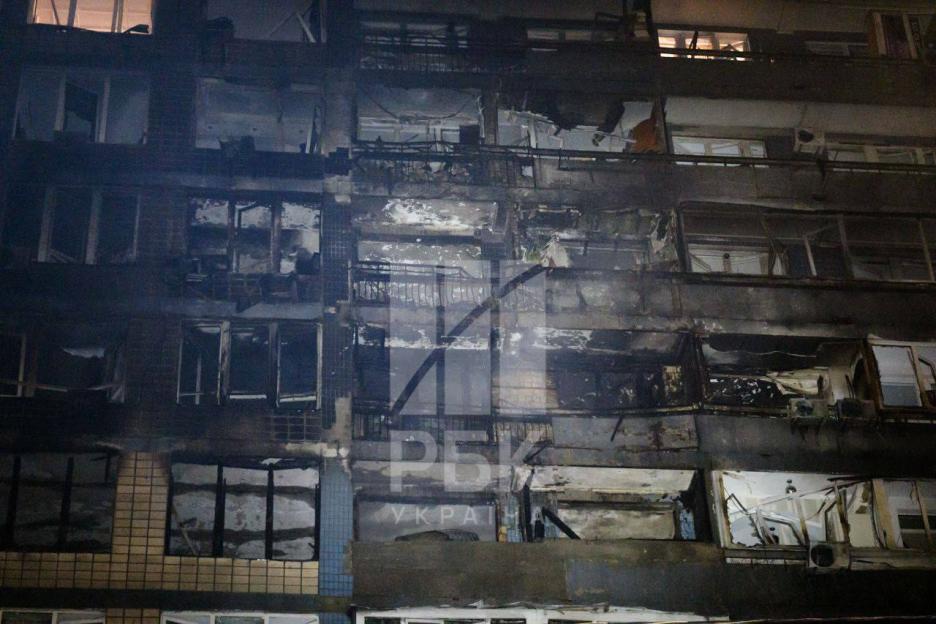 Burned and damaged building facade following a strike.