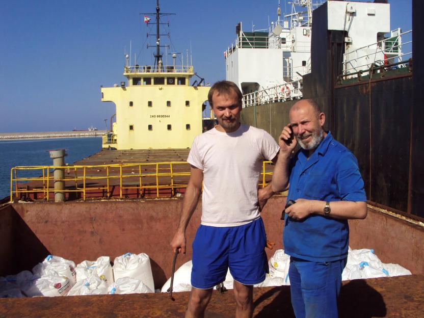 Captain Boris Prokoshev and another sailor pose with the explosive cargo in Beirut in 2014
