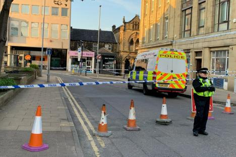 Man, 20, charged with murder of boy, 16, after teen ‘stabbed to death on busy high street in broad daylight’