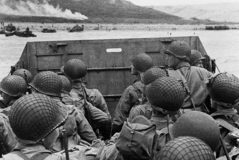 American soldiers in a landing craft approaching Utah Beach on D-Day.