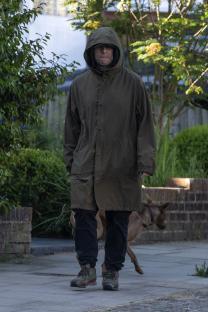 Liam Gallagher walking his dog.