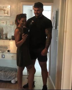 A couple taking a selfie.