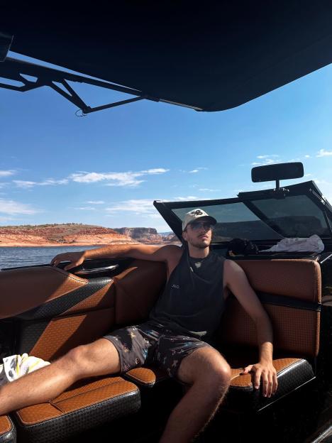 Man relaxing on a boat.