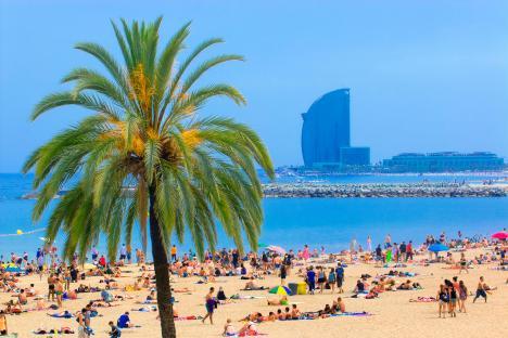 Barceloneta Beach in Barcelona with the W Hotel in the background.