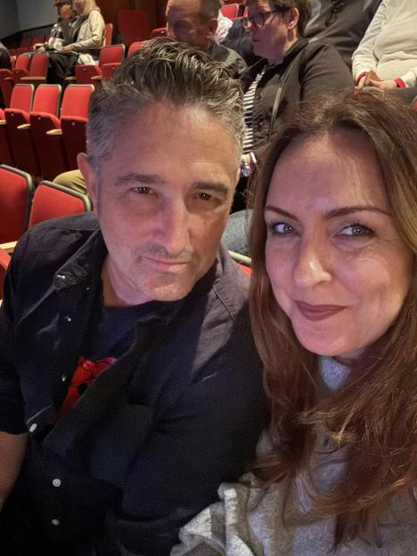 Photo of Carli Norris and a man.