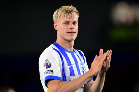 Jan Paul Van Hecke, Brighton and Hove Albion defender, applauding.