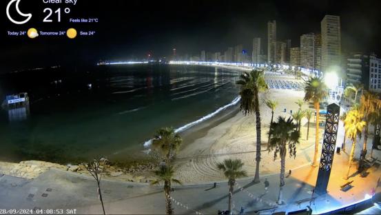 Nighttime CCTV footage of a beach in Benidorm, Spain.