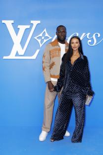 Stormzy and Maya Jama at a Louis Vuitton fashion show.