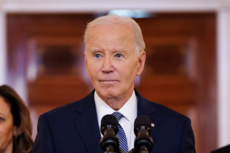 President Biden speaking at a podium.