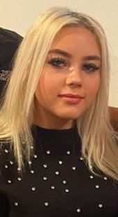 Headshot of a young woman with blonde hair.