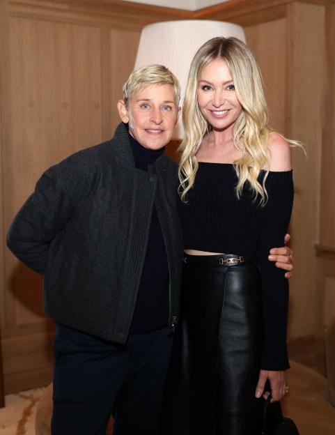 Ellen DeGeneres and Portia de Rossi at an event.