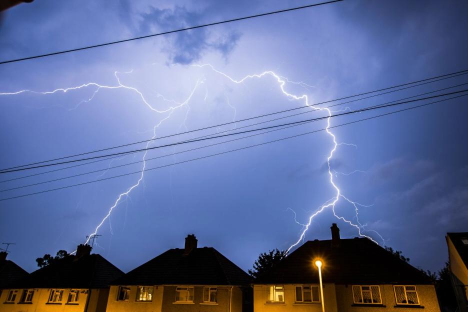 UK hit by FOUR HUNDRED lightning strikes in just a day as cluster of thunderstorms & heavy rain lash nation