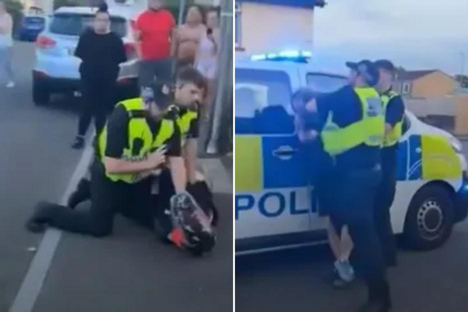 Shock moment cop PUNCHES biker in face on side of road after yelling ‘I’ll break your nose’