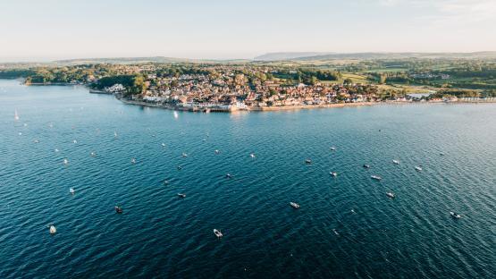 Aerial view of yachts off the Isle of Wight coast.