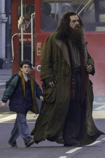 Photo of Nick Frost as Hagrid and Dominic McLaughlin as Harry Potter filming a scene for the HBO Harry Potter reboot.