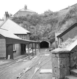 Black and white photo of Dinorwig slate quarry tunnel entrance.