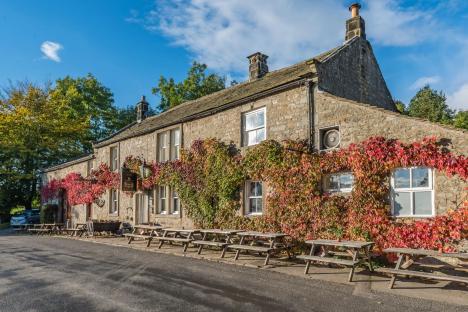 Tiny UK village with ‘best pub in WORLD’ that’s ‘like stepping into a postcard’ is one of most beautiful places to live