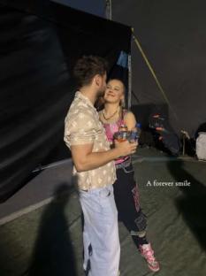 Chris Hughes and JoJo Siwa embracing.