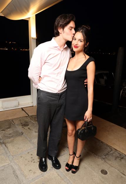 Louis Partridge kisses Olivia Rodrigo on the forehead at the premiere event for the Apple TV+ limited series “DISCLAIMER” at Harry's Dolci.