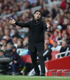 Mikel Arteta, Arsenal manager, looking frustrated on the sidelines.